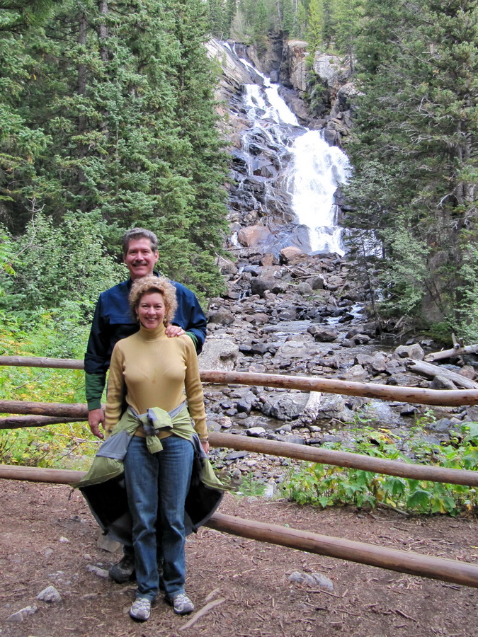 Hikers at Hidden Falls in Jackson Hole, Wyoming