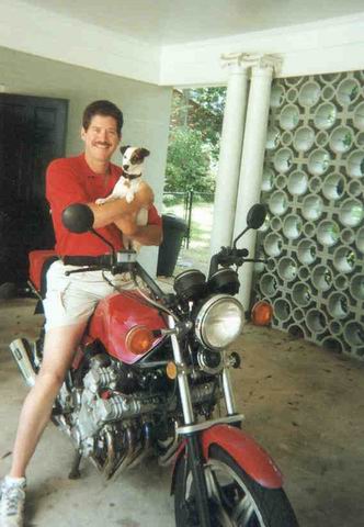 Cal holding Sweetpea on Renee